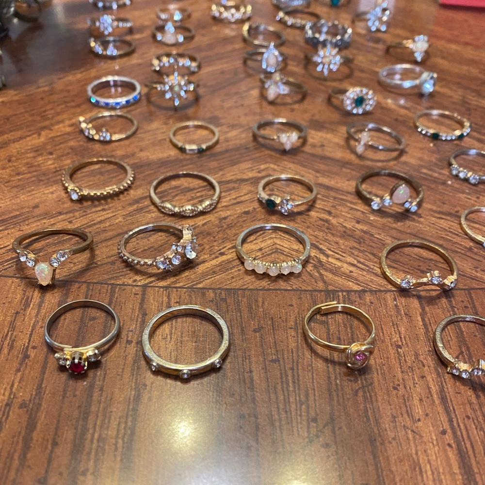47 dainty rings roughly size 7-9 some are adjustable